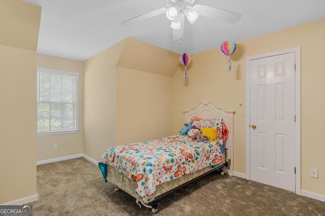 bedroom with ceiling fan, carpet, and baseboards