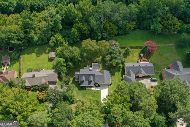 birds eye view of property with a residential view