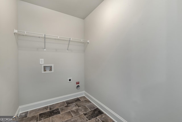 washroom with laundry area, baseboards, washer hookup, and electric dryer hookup