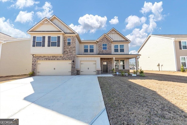 craftsman-style home with board and batten siding, concrete driveway, a porch, and a garage