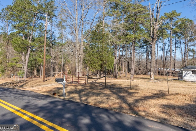 view of yard featuring a gate and fence