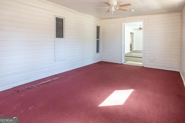 interior space with a ceiling fan