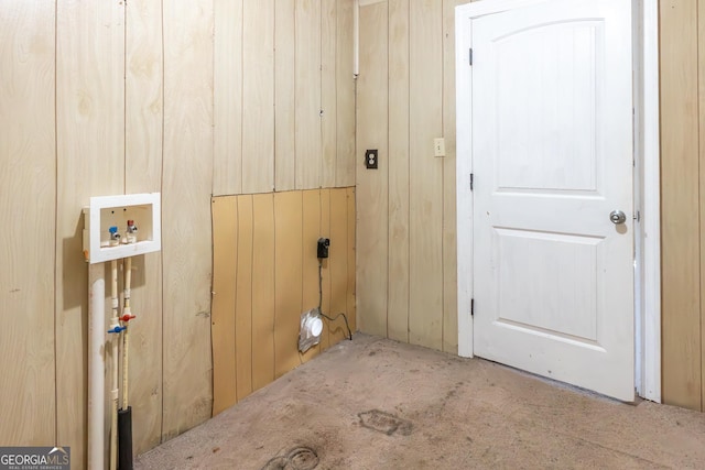 laundry room featuring washer hookup, laundry area, and wood walls