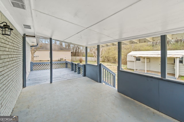 view of patio / terrace featuring visible vents