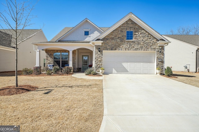 craftsman inspired home featuring stone siding, concrete driveway, a porch, and an attached garage