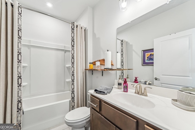 bathroom with shower / bath combo, vanity, and toilet