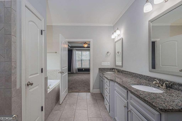 bathroom with double vanity, ornamental molding, and a sink