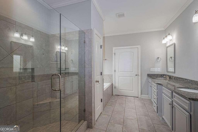 full bath featuring a garden tub, ornamental molding, a sink, and a stall shower