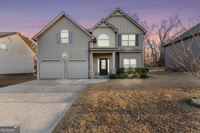 craftsman-style home featuring concrete driveway, board and batten siding, and an attached garage