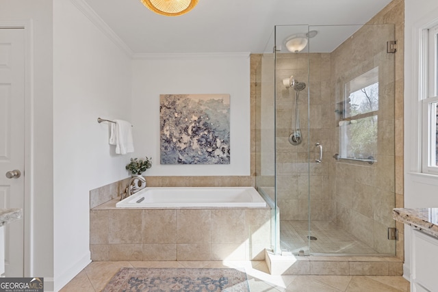 full bath with tile patterned floors, a shower stall, crown molding, a bath, and vanity