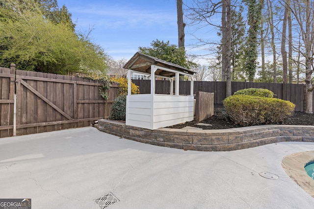 exterior space featuring a fenced backyard