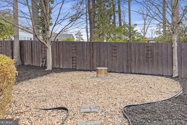 view of yard featuring a fenced backyard