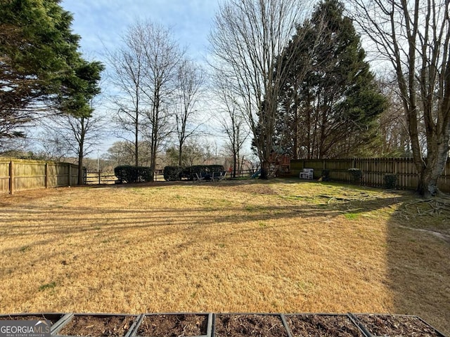 view of yard featuring fence