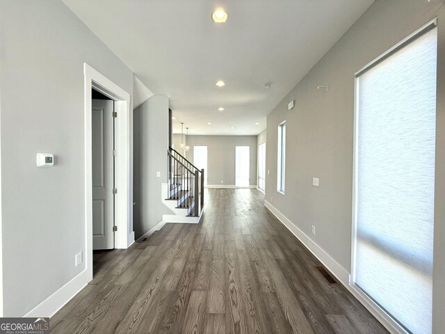 827 Winslow Way NW, Atlanta, GA 30318 - corridor featuring visible vents, baseboards, dark wood finished floors, stairs, and recessed lighting