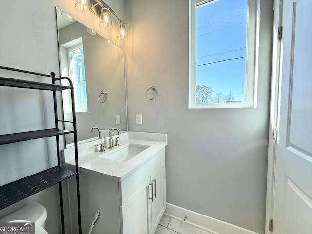 827 Winslow Way NW, Atlanta, GA 30318 - bathroom with marble finish floor, vanity, and baseboards