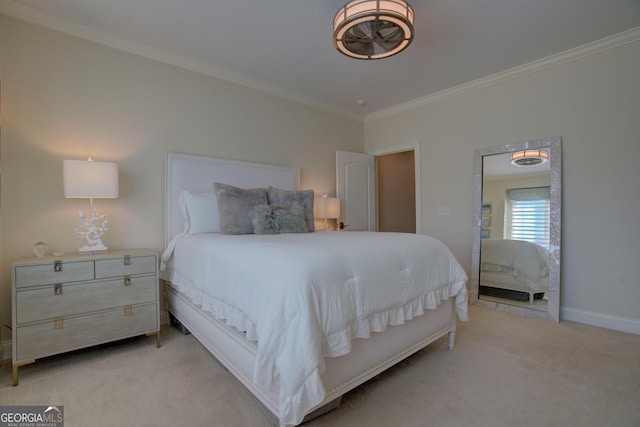 bedroom featuring ornamental molding, light colored carpet, and baseboards