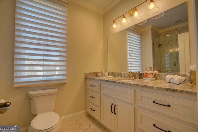 full bathroom featuring toilet, ornamental molding, a stall shower, vanity, and tile patterned floors