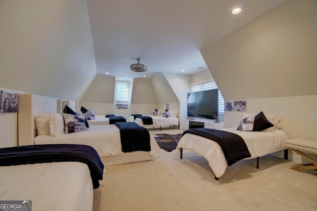 carpeted bedroom featuring recessed lighting and lofted ceiling