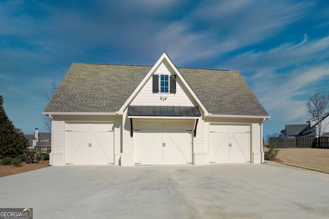 detached garage with fence