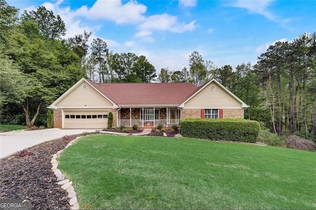 ranch-style house featuring brick siding, a porch, a garage, driveway, and a front lawn