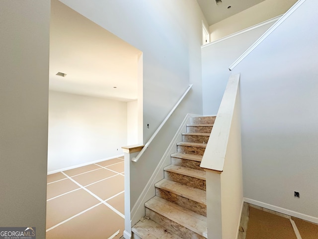 stairway with baseboards