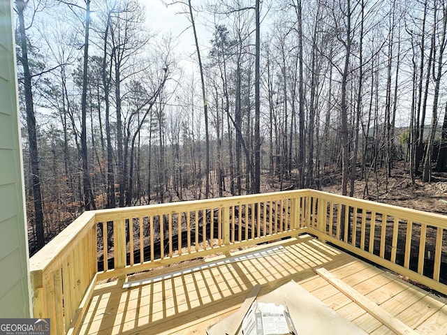 deck with a forest view