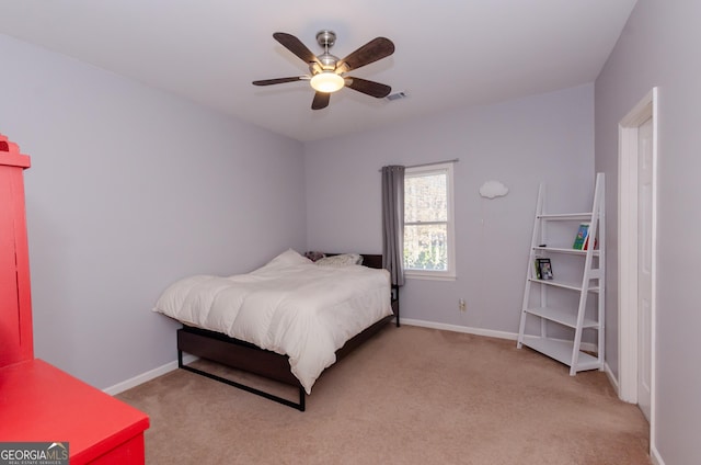 bedroom with light carpet, baseboards, visible vents, and ceiling fan