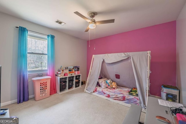 bedroom featuring carpet floors, ceiling fan, and visible vents