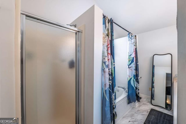 bathroom with marble finish floor