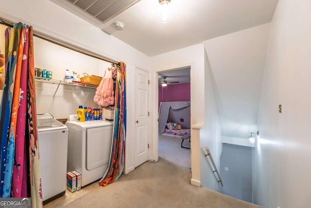 laundry area with laundry area, visible vents, separate washer and dryer, and carpet flooring