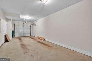 garage with baseboards