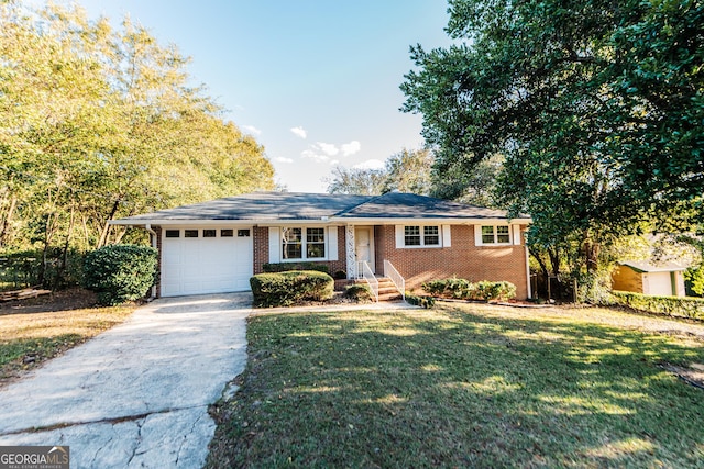 ranch-style house with concrete driveway, brick siding, a front lawn, and an attached garage