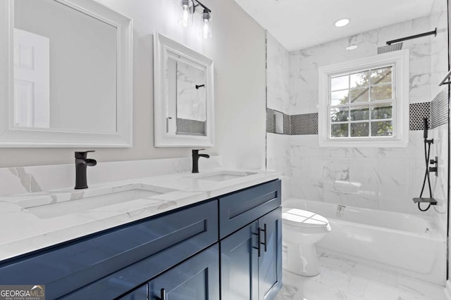 full bath with marble finish floor, double vanity, a sink, and toilet