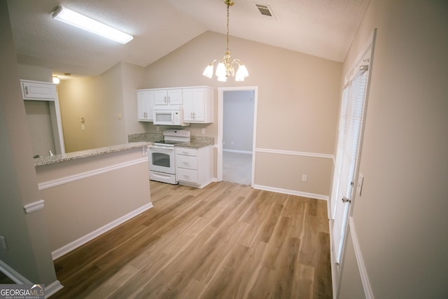 kitchen with white appliances, visible vents, white cabinetry, vaulted ceiling, and light wood-type flooring