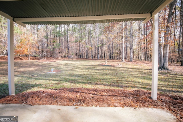 view of yard featuring a view of trees