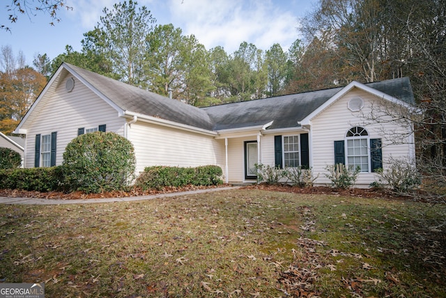 single story home with a front yard