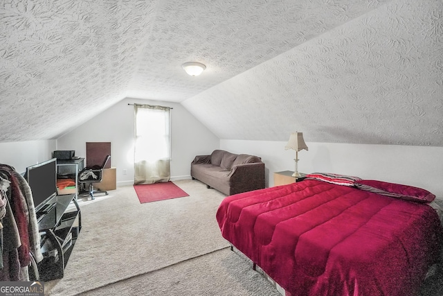 bedroom with lofted ceiling, a textured ceiling, carpet, and baseboards