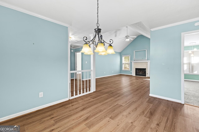 unfurnished living room with a fireplace, ornamental molding, and wood finished floors