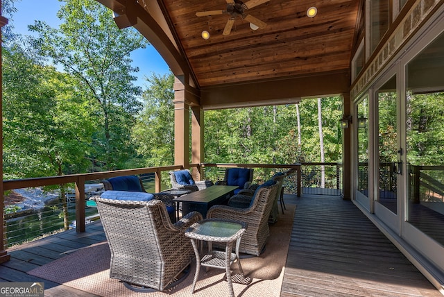 deck with ceiling fan and french doors