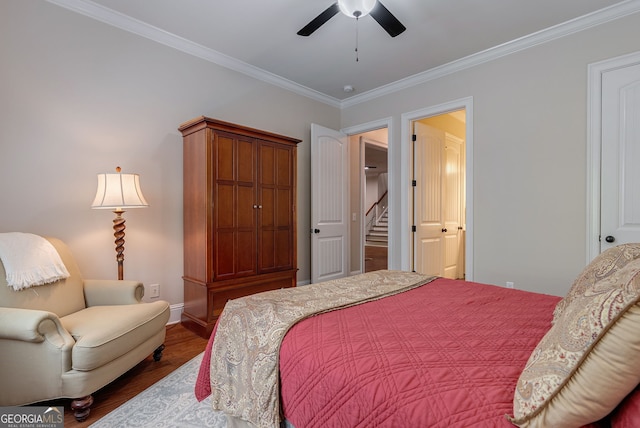 bedroom with ceiling fan, ornamental molding, wood finished floors, and baseboards