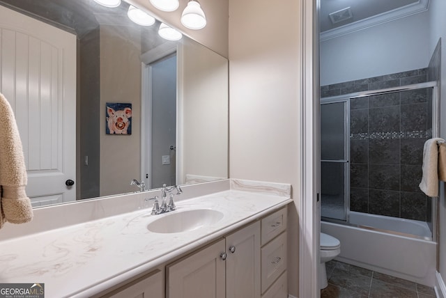 full bath with toilet, combined bath / shower with glass door, and vanity