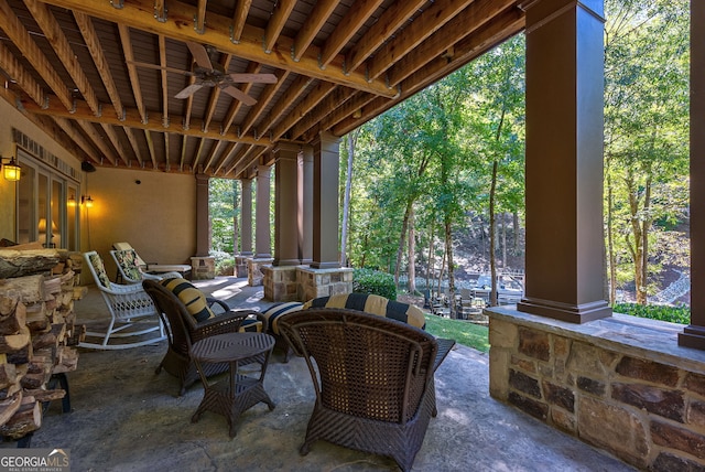 view of patio with a porch and a ceiling fan