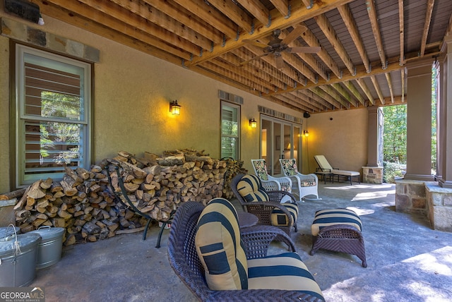 view of patio / terrace with a ceiling fan and outdoor lounge area