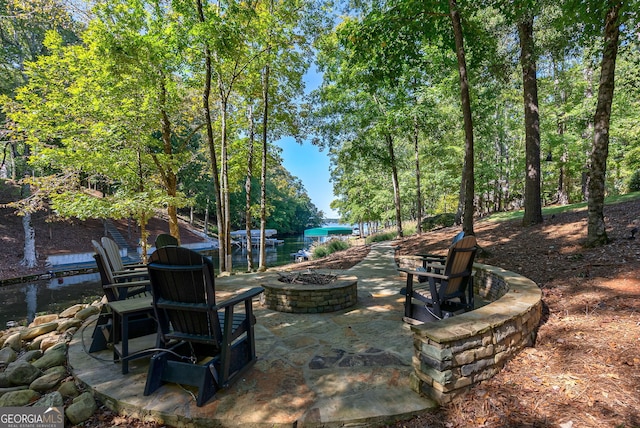 view of patio with an outdoor fire pit