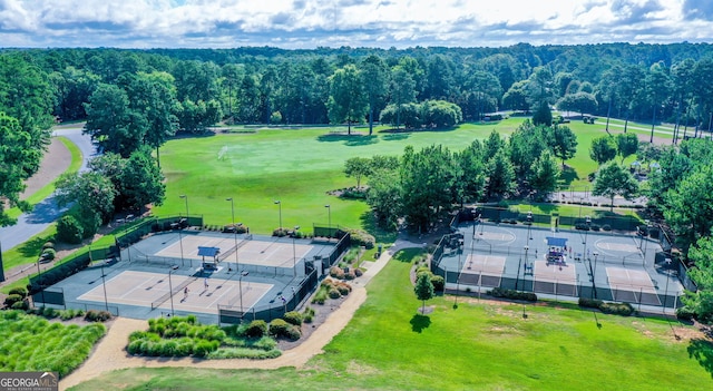 drone / aerial view with a view of trees