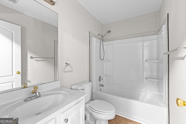 bathroom with tile patterned flooring, toilet, visible vents, vanity, and shower / washtub combination