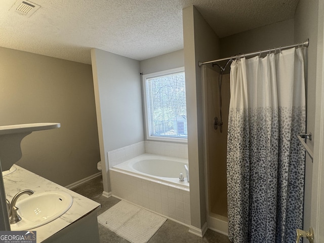 bathroom featuring visible vents, toilet, a stall shower, and a bath