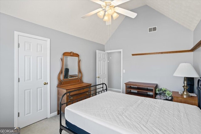 bedroom featuring light carpet, high vaulted ceiling, visible vents, and a ceiling fan