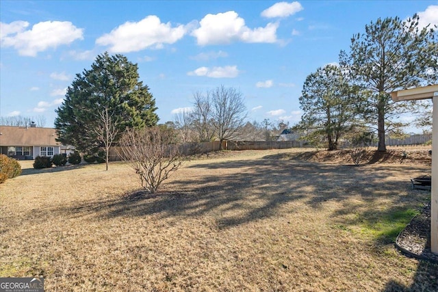 view of yard featuring fence