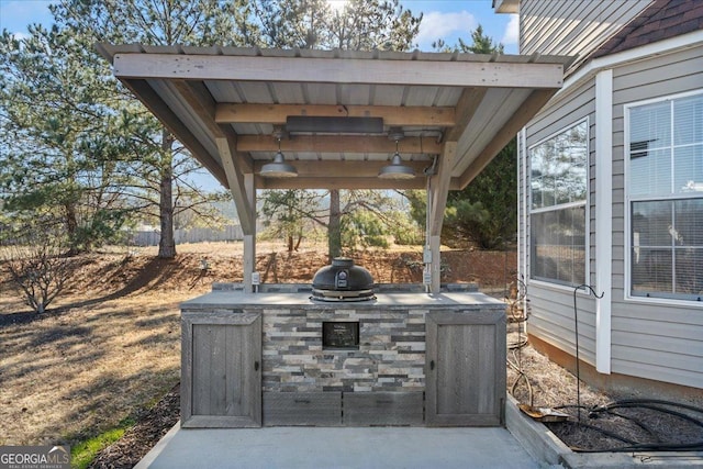 view of patio with an outdoor kitchen